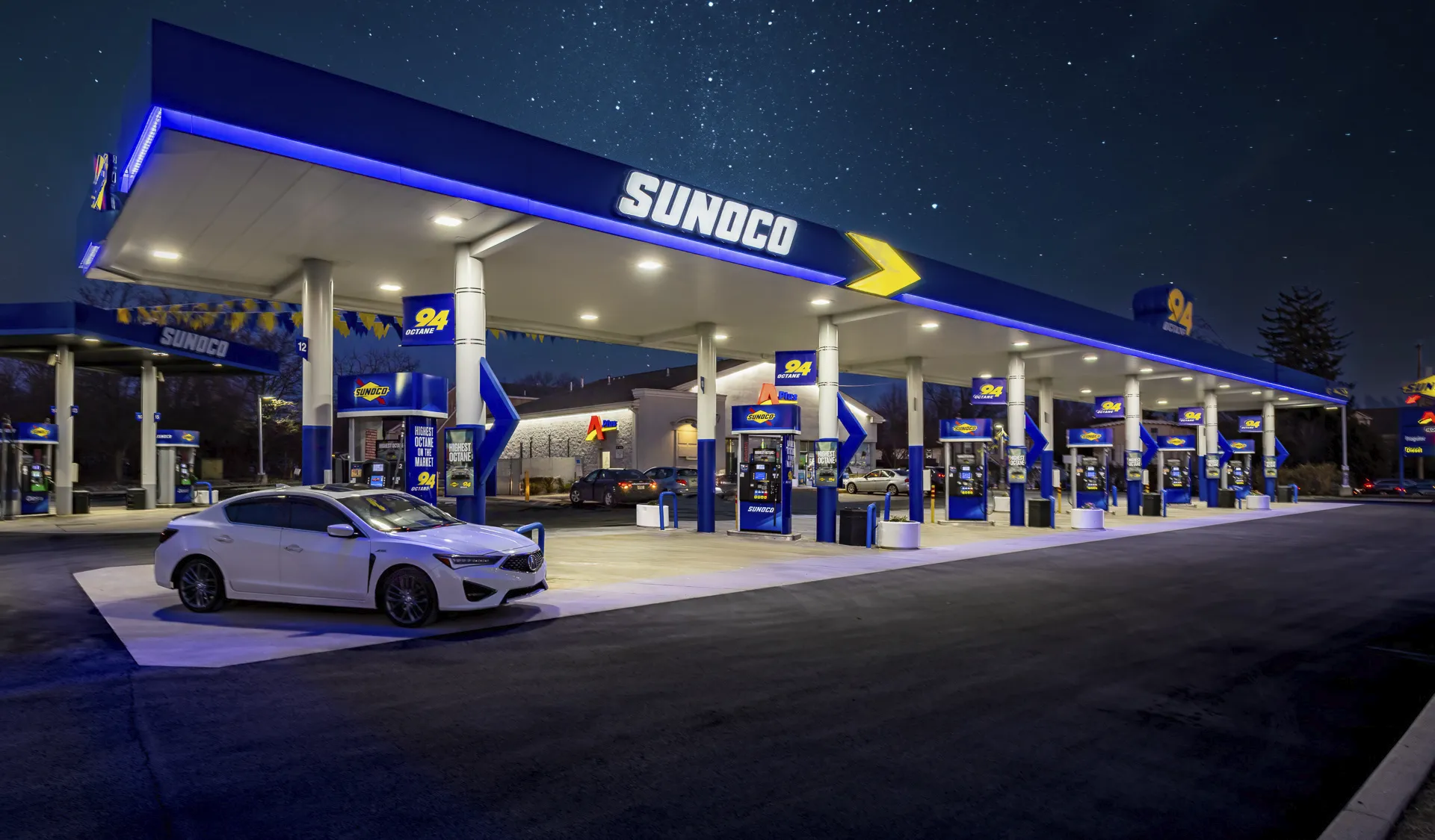 Exterior Sunoco station at night