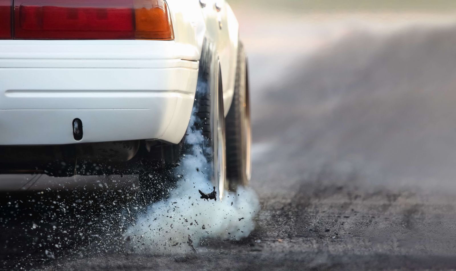 Race car burning rubber