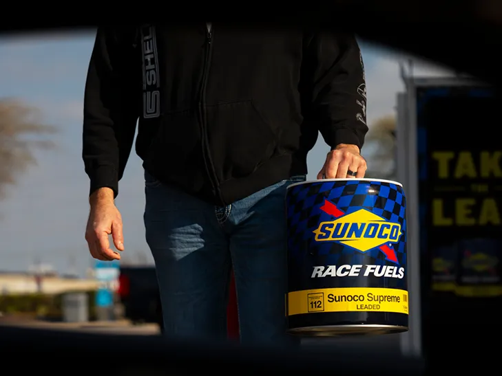 Sports car filling up at Sunoco station